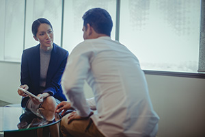 Ocean County web design professional reviewing a website with business owner